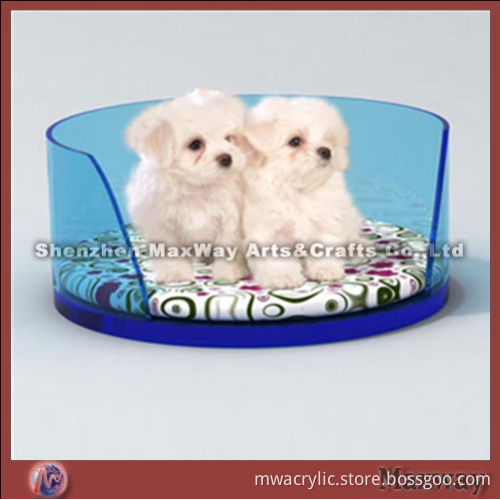 Round blue lucite/acrylic dog bed with cushion